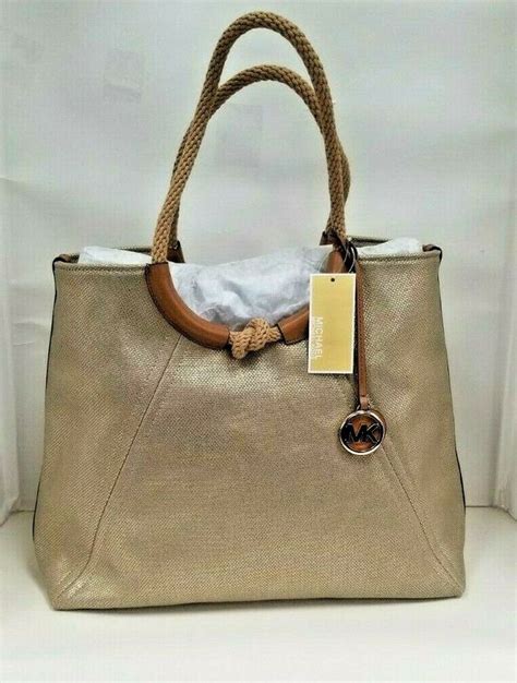 michael kors isla ring shoulder tote pale gold|Isla Large Canvas Tote Bag .